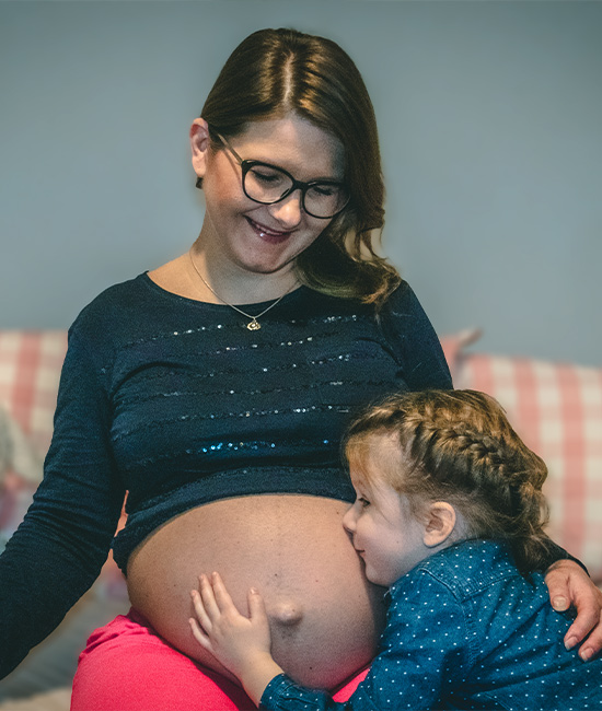 Iza is mum to Alicja and carries a second little miracle in her belly.