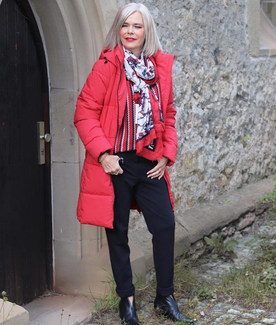 Claudia makes a fashion statement with powerful red