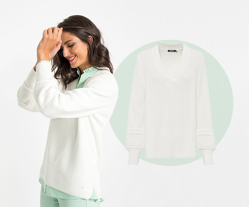 A white v-neck sweater is an important fashion basic.